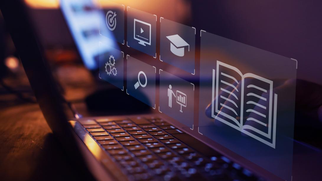 Image of laptop with virtual icons appearing over keyboard