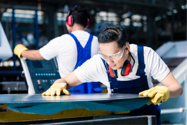 Workers undertaking industrial processes