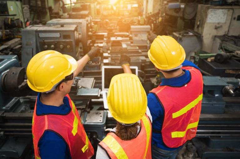 Workers performing a site inspection