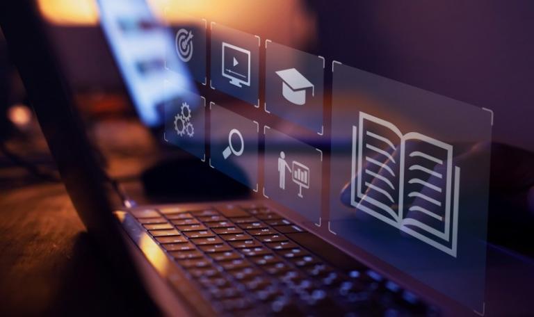 Image of laptop with virtual icons appearing over keyboard